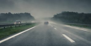 car on a road in rainy weather